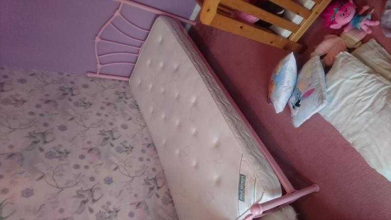 Pink metal single bed