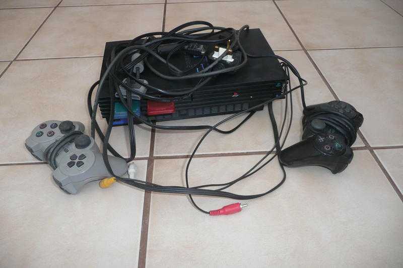 PLAY STATION 2 WITH LOTS OF GAMES AND EXTRAS