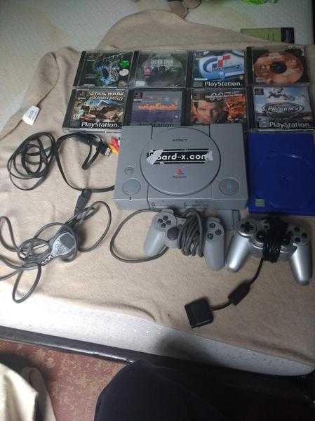 Playstation 1 with 9 games and acesories