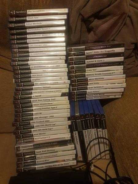 Playstation 2 with 54 games, 2 controllers and memory card