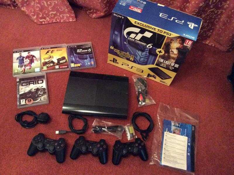 Playstation 3 slimline 500GB with controllers and games