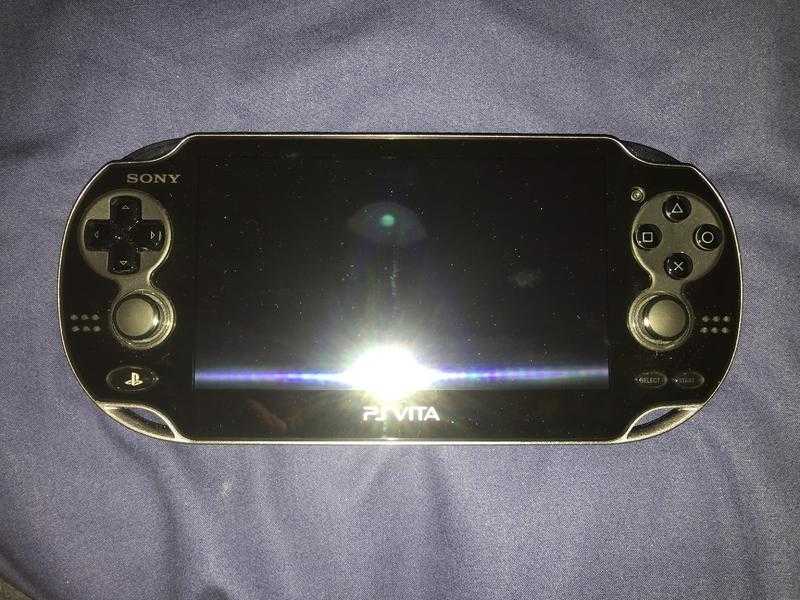 Playstation Vita w Case, 3 games, official earbuds and Charger