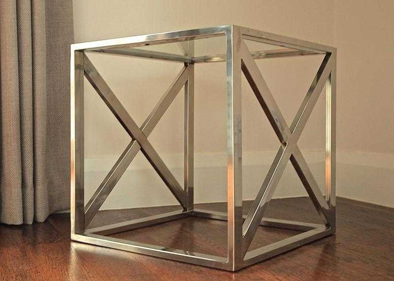 Polished aluminium 039criss-cross039 side table.