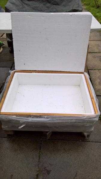 Polystyrene-lined wooden pallet for reclaimed tiles or other similar uses.