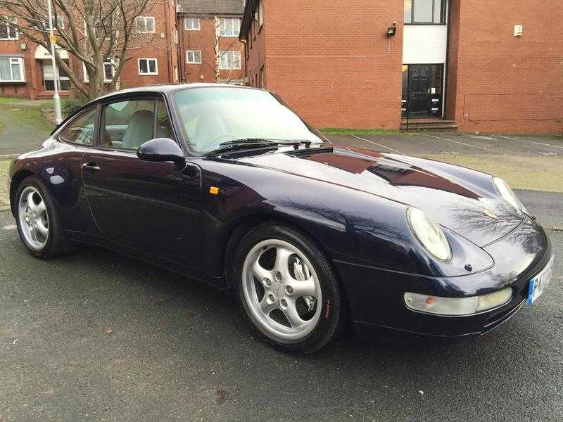 PORSCHE 911 (993) CARRERA 4 COUPE, 6 SPEED MANUAL, FULL PORSCHE DOCUMENTED  EXTENSIVE (O.P.C) SERVICE HISTORY FROM NEW.