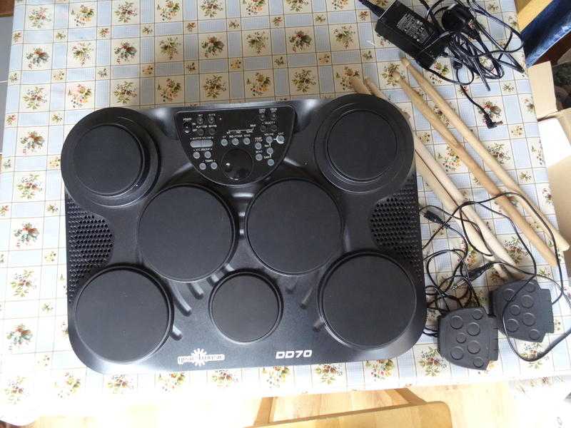 Portable electronic drum pads