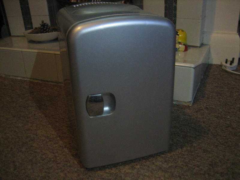 Portable Sliver Mini Fridge CoolerWarmer for Home ,Office, Camping(has plug to the electric mains)