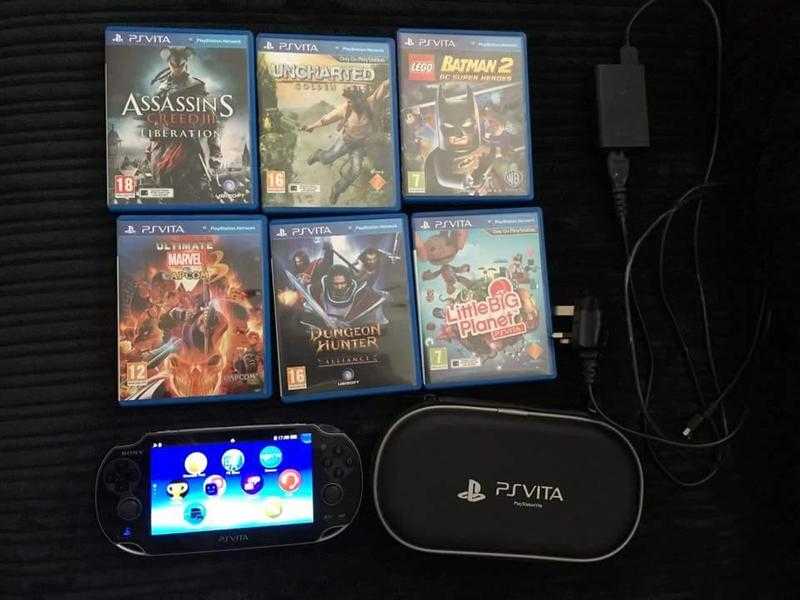 Ps vita with 6 games, 8 gig memory card, case and charger