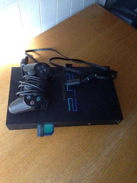 PS2 with 3 Tomb Raider Games