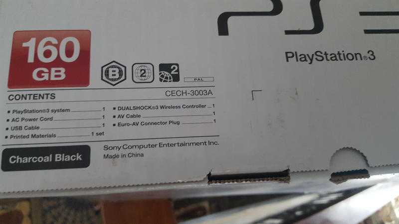 ps3 160gb black console wth 2 remote controller and colin mcrae rally game