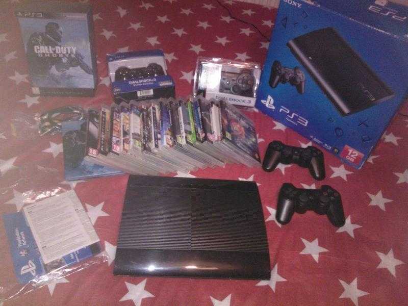 PS3 SuperSlim 500 Gb  4 controllers (3 sony) boxed with all leads and alot of games