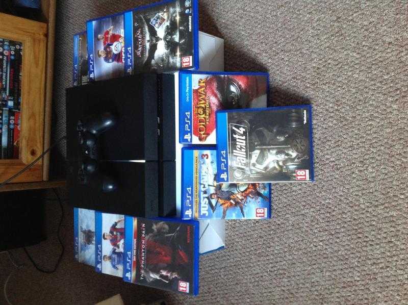 PS4 500gb with one controller plus 9 games boxed