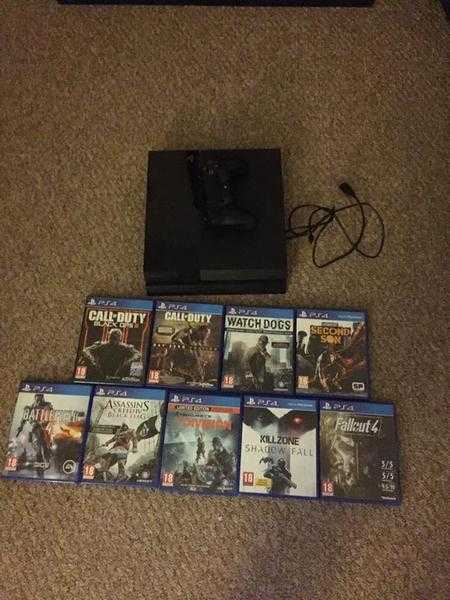 PS4 in mint condition with 9 top games one controller and an unused PS headset