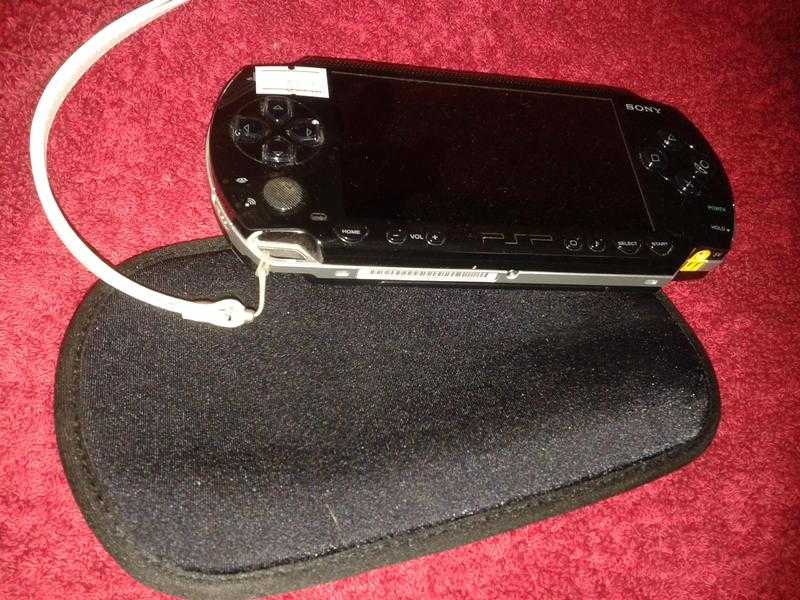 PSP black with charger, Good working order, comes with mains charger