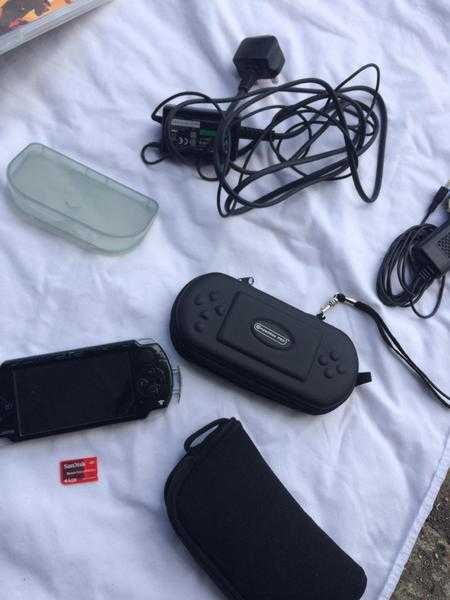 Psp with 15 games ans 1gb plus car charger