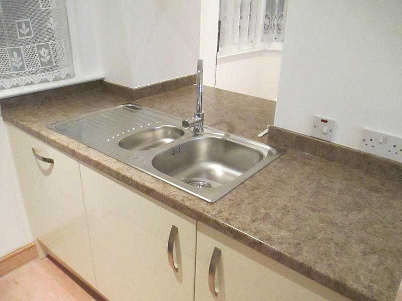 Qualified Carpenter available for Kitchen fitting and worktop cutting.