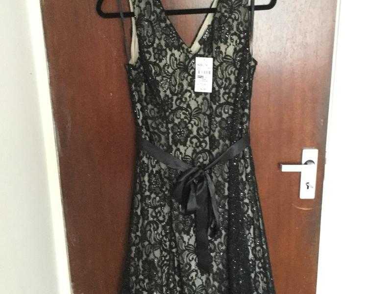 Quiz clothing size 18. Black lace dress with tie belt around waist.