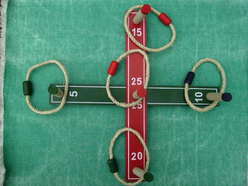 QUOITS.  A CLASSIC GAME OF SKILL THAT IS FUN TO PLAY.