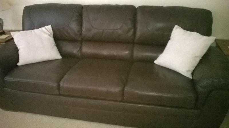 Real Leather 3 piece suite less than two years old in perfect condition.