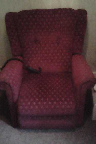 Recliner armchair with lift out position