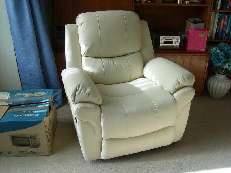 Reclining Armchair. Cream Leather, modern design. Unused. Delivered locally to Banstead.