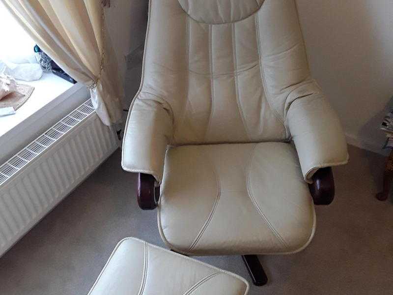 Reclining chair with footstool