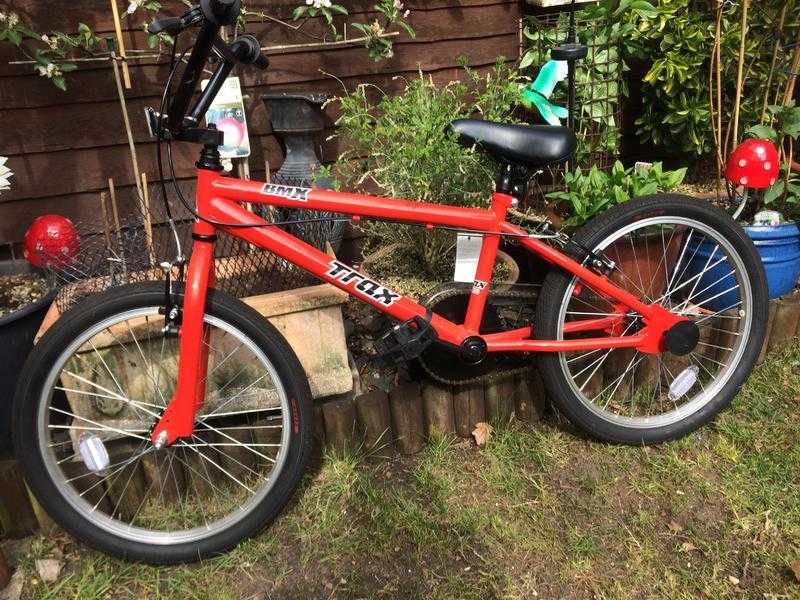 Red bmx 19inch wheeled bike. Used once. Vgc 50
