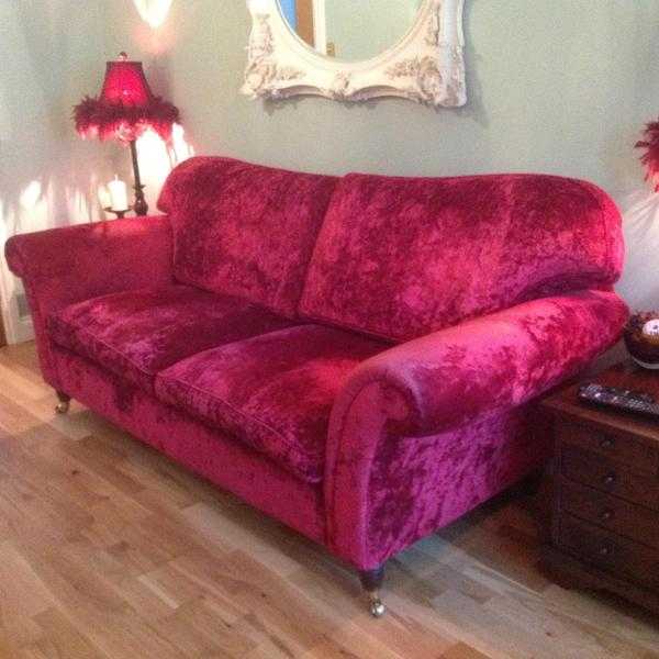 Red crushed velvet sofa