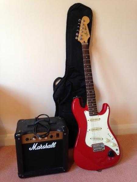 Red Fender Squirer Bullet guitar and Marshall G10 Amp