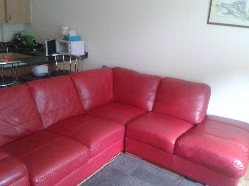 Red leather corner sofa