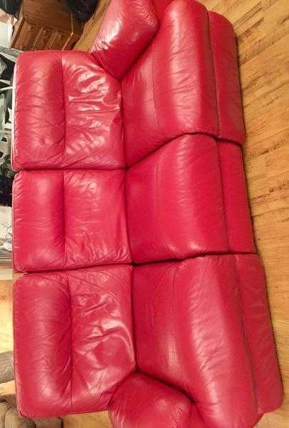 Red leather three seater recliner sofa