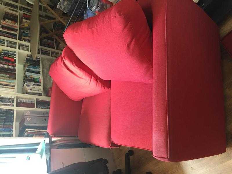 Red two seater sofa