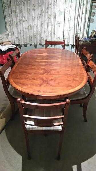 Regency style mahogany dining table and 6 chairs