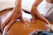 Relaxing massage by female therapist.
