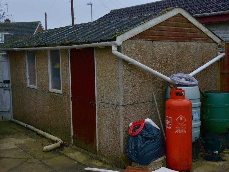 Removal of Concrete garage (asbestos roof)  free