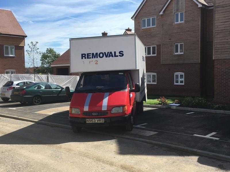 Removals van with working man