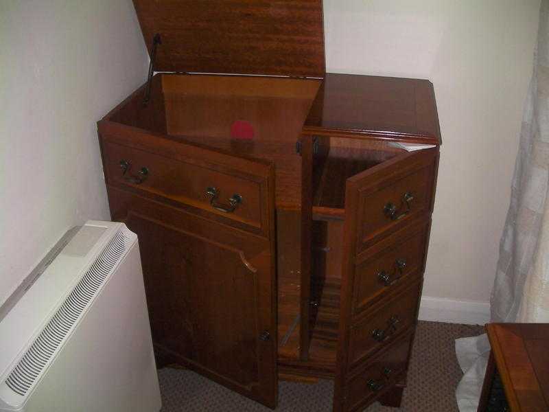 Reproduction Yew cabinet.