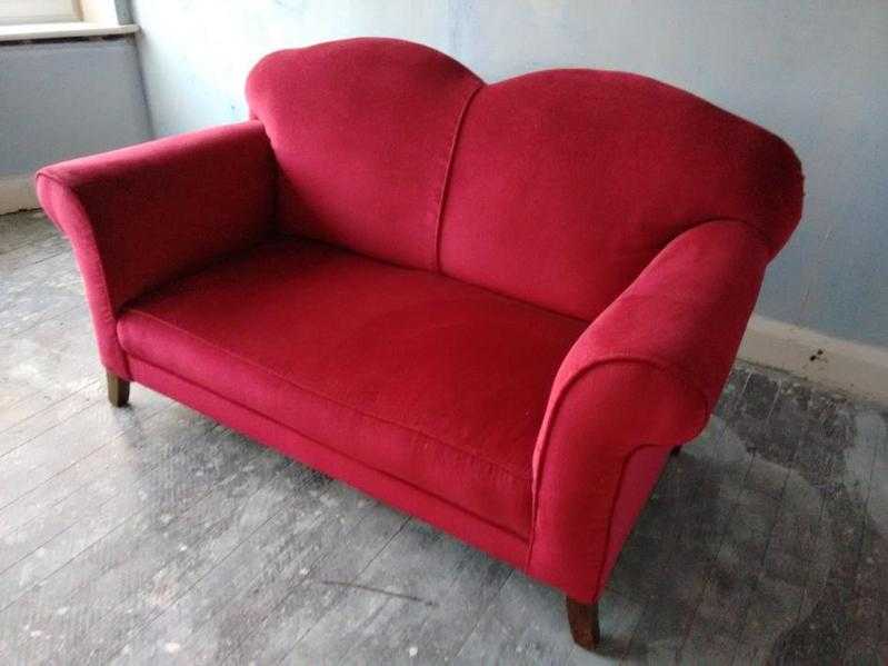 Rich cherry red drop arm sofa