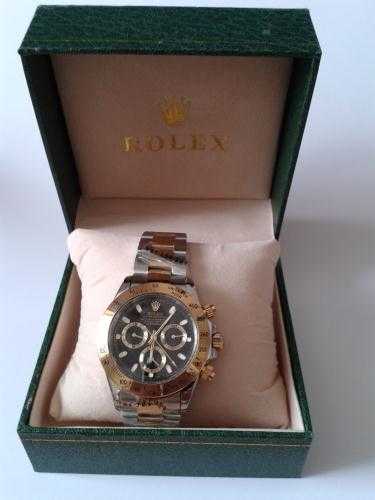 ROLEX DAYTONA STAINLESS STEEL AND GOLD COLOUR UNWORN SUPPLIED IN GREEN ROLEX BOX