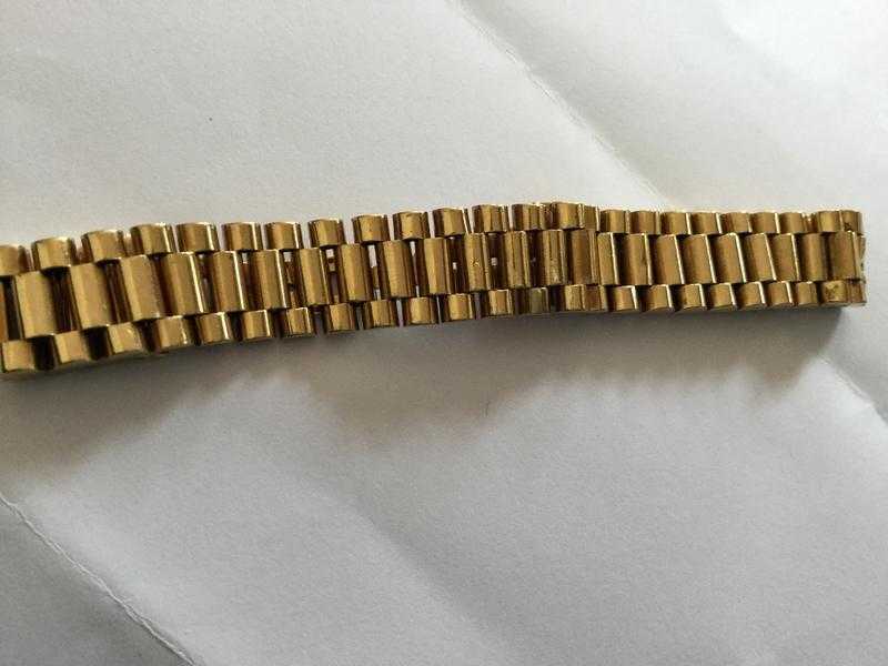 Rolex president design after mark bracket band . 9 cart gold