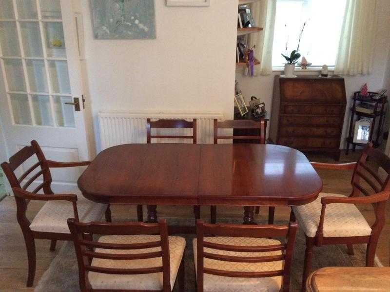 Rosewood, French style dinning table amp six chairs.