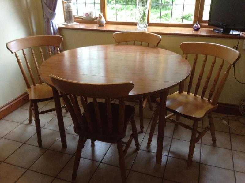 Round Dining Table and Four Chairs