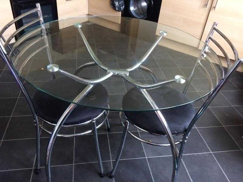 Round glass dinning table