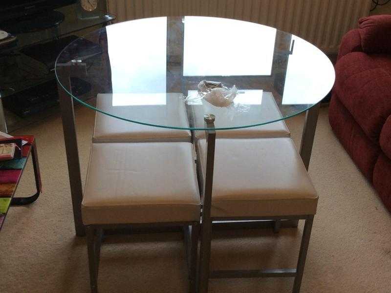 Round glass table and chairs for sale