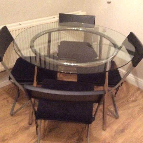 Round glass top table