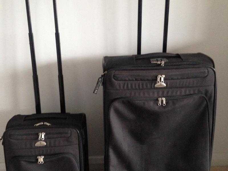 Samsonite extendable black suitcases