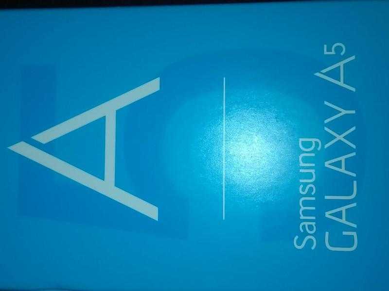 Samsung Galaxy A5 16GB, in midnight black, still factory sealed in box