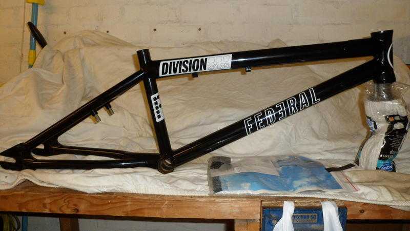 Selection of BMX bike frames and parts.