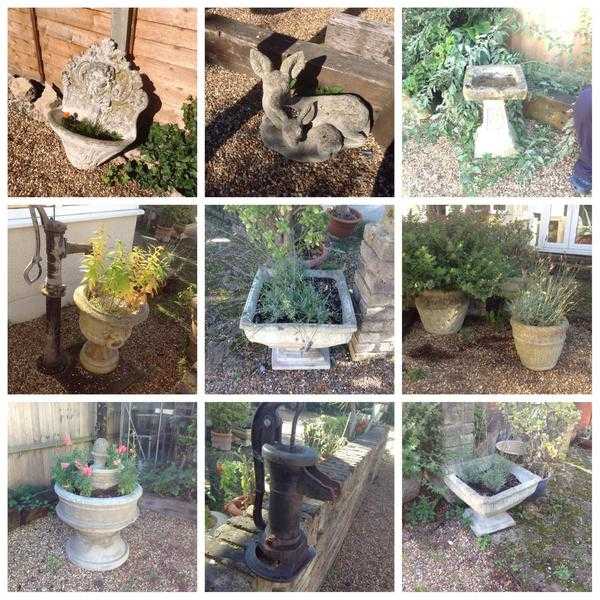 Selection of garden ornaments and stone planters