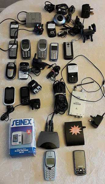 Selection of mobile phones, chargers and miscellaneous